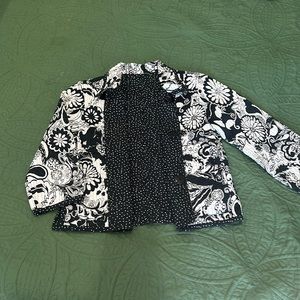 Women’s reversible quilted blazer, buttons & pockets both inside & out.